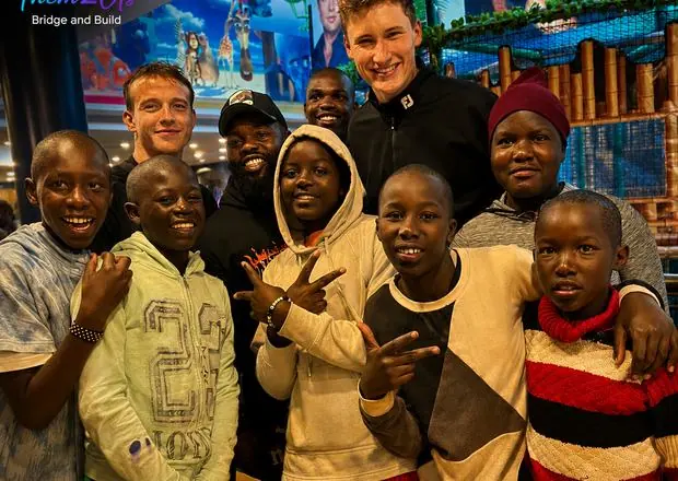 Children at the cinema during the Them2Us Nairobi mission